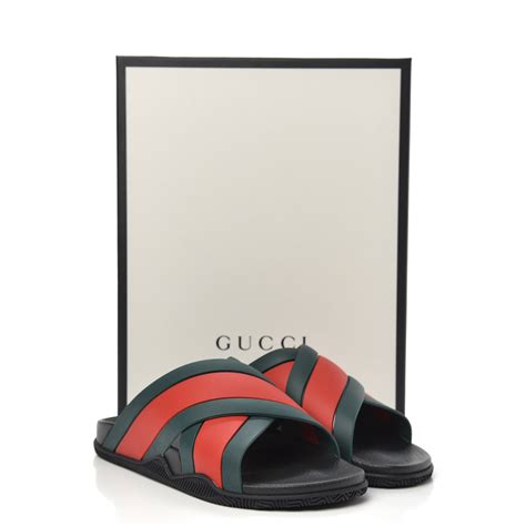 cross over gucci slides|Gucci rubber sandals.